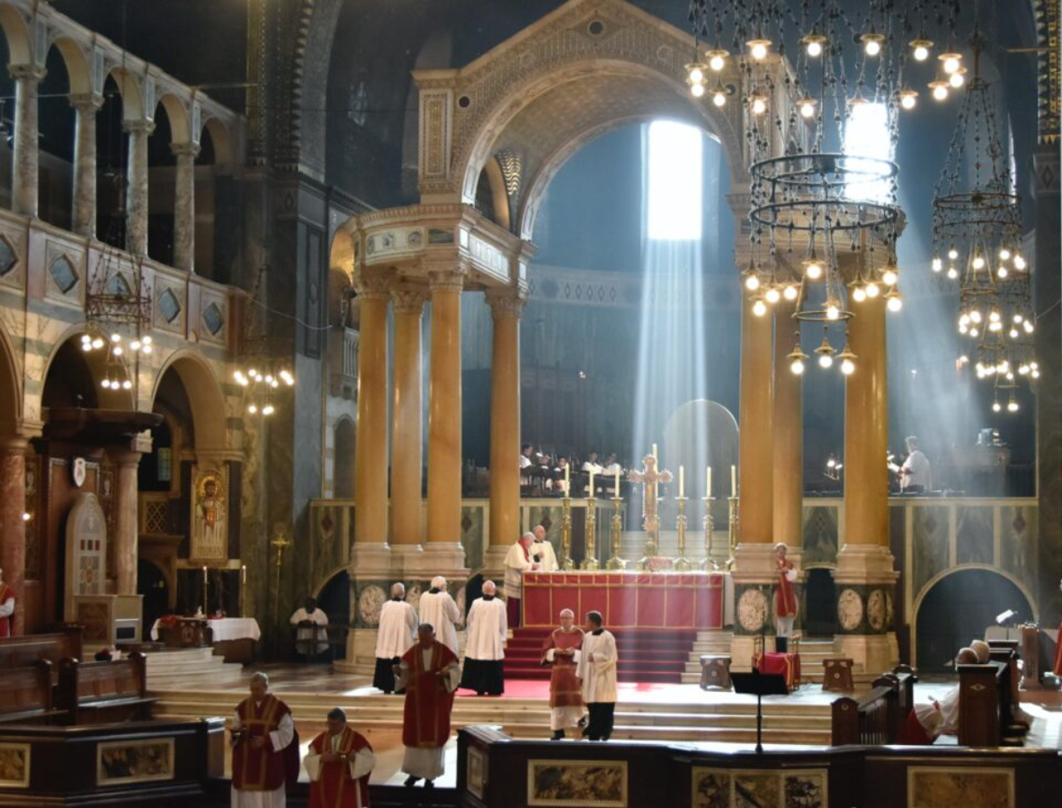 High Mass, Westminster Cathedral – the choir in their stalls behind the High Altar