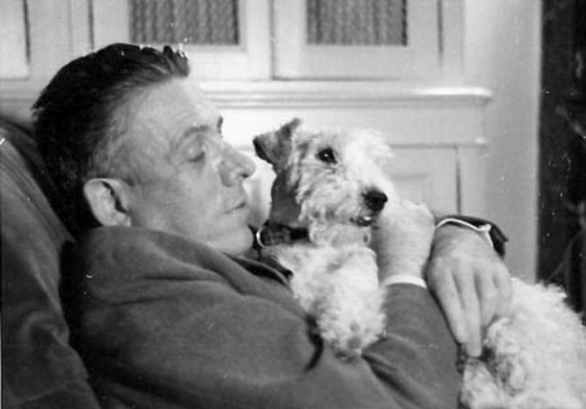 Francis Poulenc, at home with his beloved terrier Mickey (collection, Library of Congress)