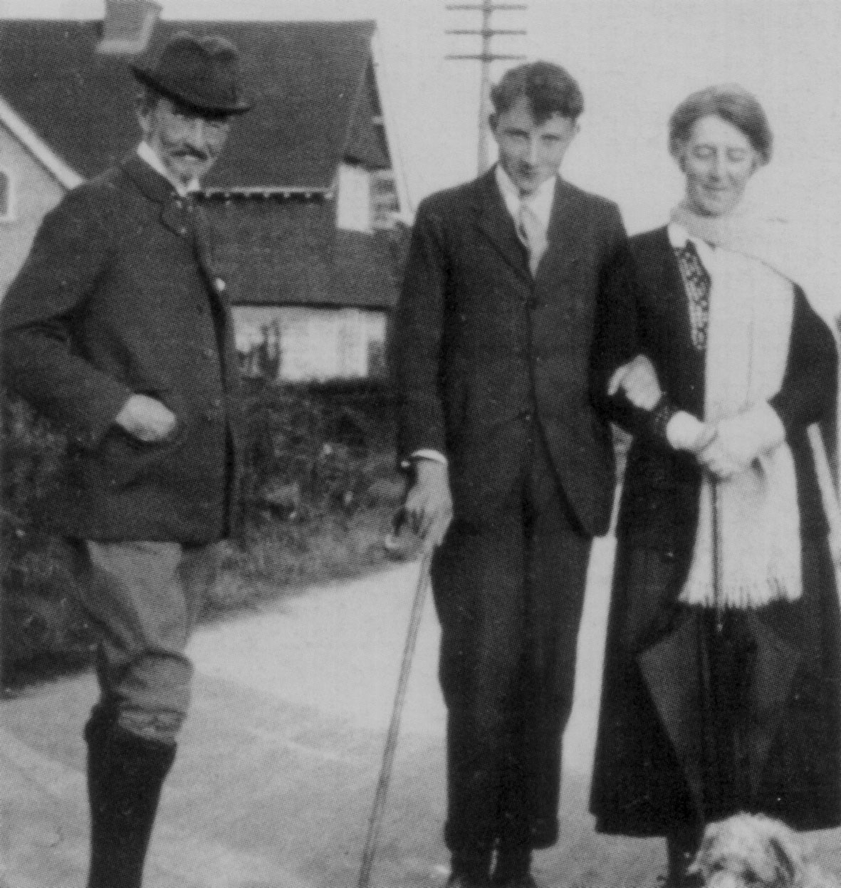 Lennox, centre, with his father, Captain Hastings Berkeley, and Sybil Jackson, outside her house, Foxcombe Cottage, Boars Hill, c. 1923