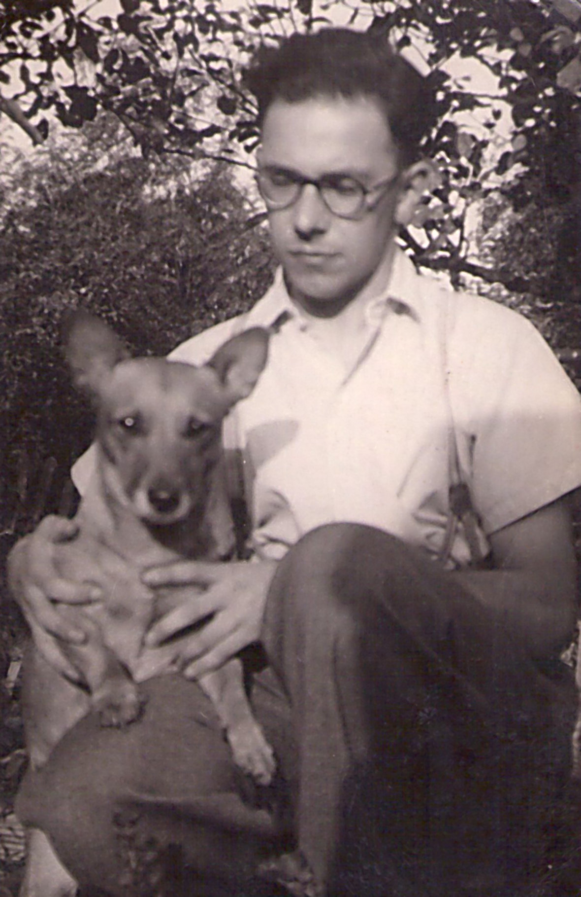 Michael Elliott with his corgi in 1949