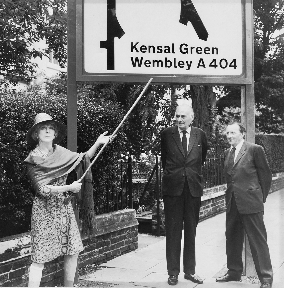 Lady Diana Cooper, Lord Kinross and Lennox Berkeley protesting against the large road sign outside their houses in Warwick Avenue, Little Venice, in the early 1970s