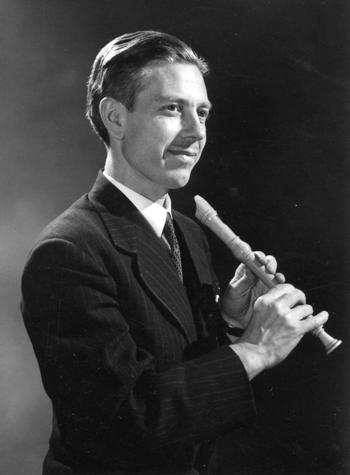 Carl Dolmetsch (dedicatee of Berkeley’s Sonatina Op 13) playing a Dolmetsch recorder (Horniman Museum)